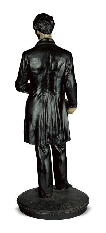 (SCULPTURE.) Full-figure statuette of Lincoln holding the Emancipation Proclamation, after Volk.